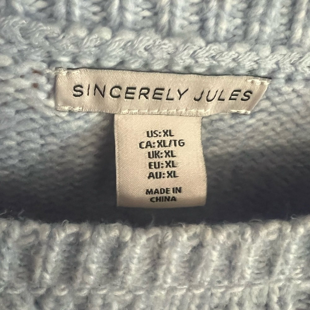 XL sweater vest, very soft and comfortable.